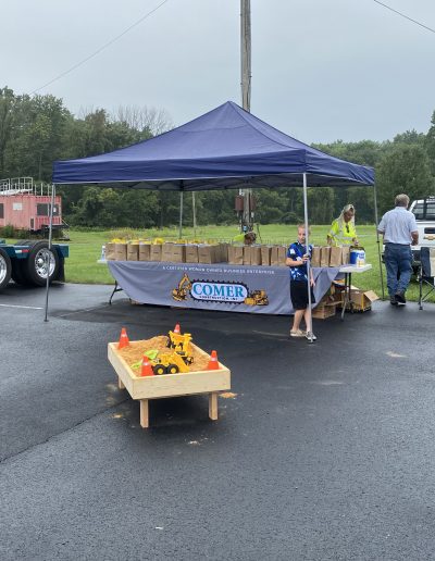 Comer Construction display booth with loot bags