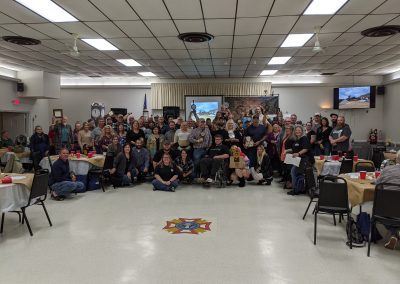Employees of Comer Construction posing in celebration of the Comer Construction Employee Milestone celebration.