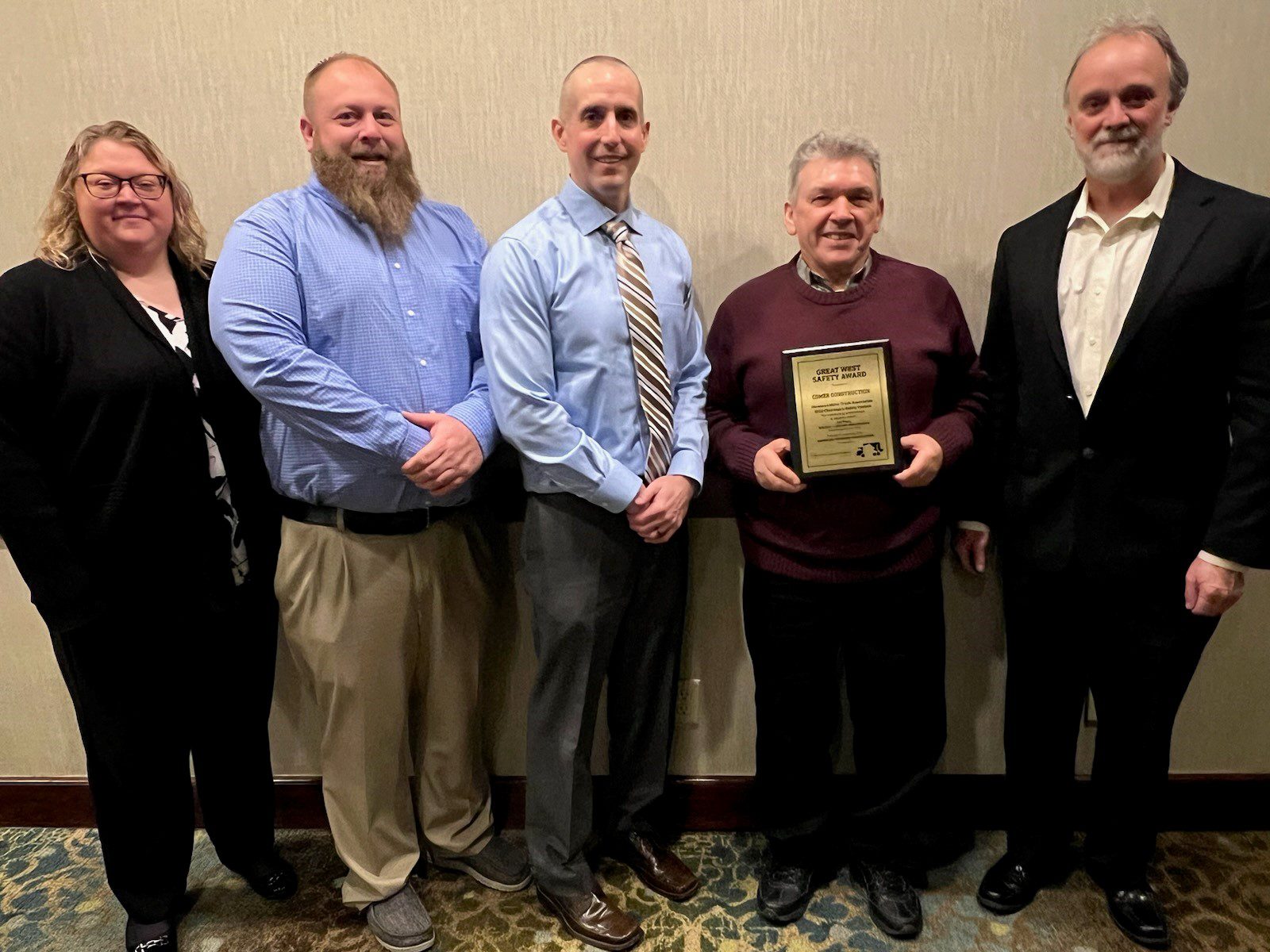 Comer Construction Leadership Team Accepting Award