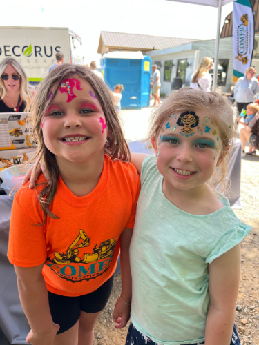 Kids enjoying the touch-a-truck event