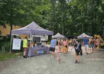 Comer Construction vehicles at a local touch-a-truck event