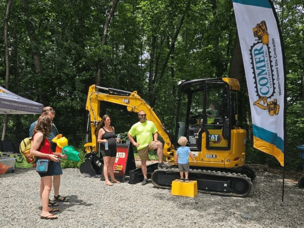 Comer Construction vehicles at a local touch-a-truck event
