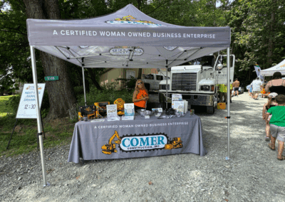Comer Construction vehicles at a local touch-a-truck event