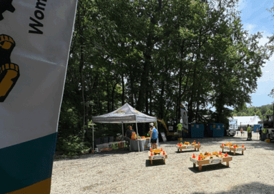 Comer Construction vehicles at a local touch-a-truck event
