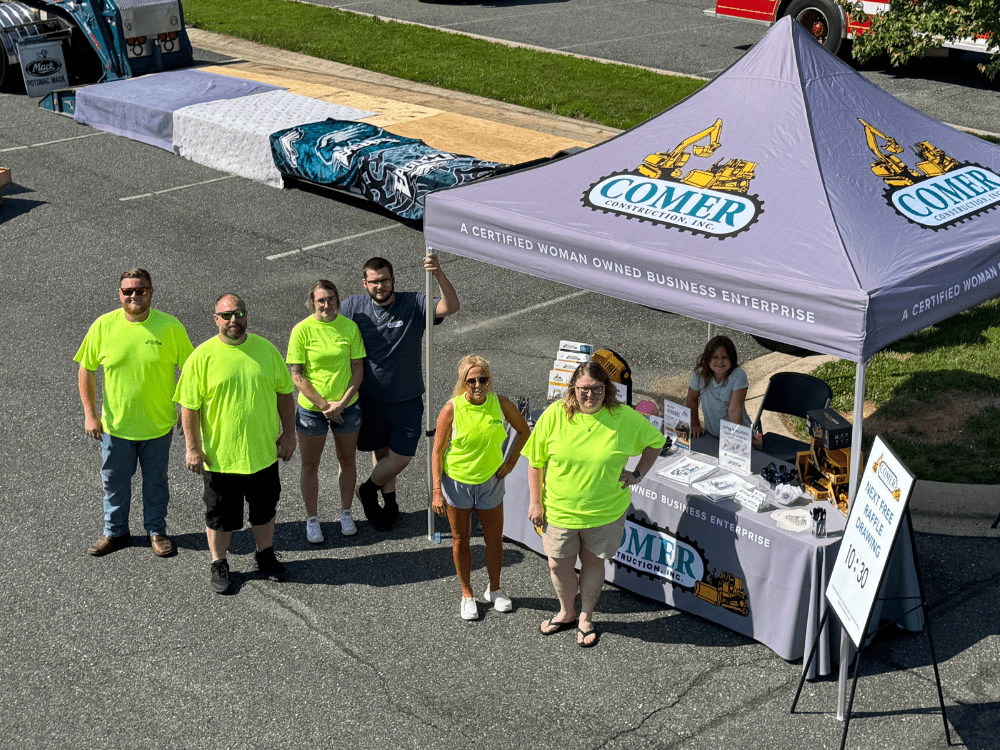 Comer Construction vehicles at a local touch-a-truck event