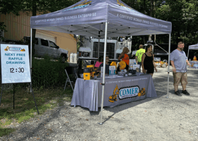 Comer Construction vehicles at a local touch-a-truck event