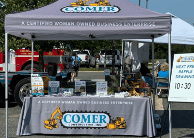 Comer Construction vehicles at a local touch-a-truck event